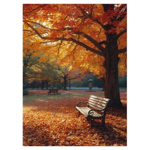 May include: A completed jigsaw puzzle depicting a park scene in autumn. The image shows a large tree with vibrant orange and yellow leaves, a park bench, and fallen leaves covering the ground. The puzzle is a landscape scene.