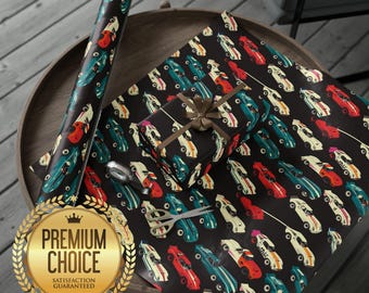 May include: Black and white wrapping paper with a repeating pattern of colorful race cars. The paper is rolled up and displayed on a wooden surface. A gold seal with the text "Premium Choice Satisfaction Guaranteed" is in the foreground.