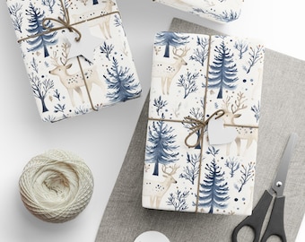 May include: Wrapped gifts with a winter forest pattern featuring deer and blue trees. The gifts are tied with twine and adorned with white heart-shaped tags. A spool of twine, scissors, and blank tags are also present.