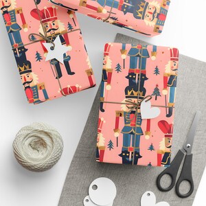 Vintage Nutcracker Holiday Wrapping Paper with Pink Background, Festive Toy Soldier Giftwrap for Christmas and Birthdays