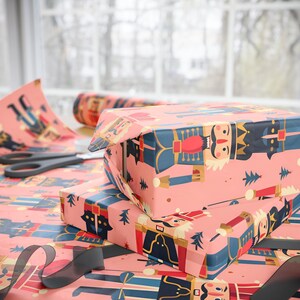 Vintage Nutcracker Holiday Wrapping Paper with Pink Background, Festive Toy Soldier Giftwrap for Christmas and Birthdays