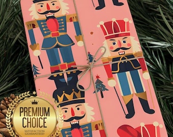 May include: A wrapped gift with pink paper printed with a repeating pattern of toy nutcracker soldiers in blue, red, and gold. The gift is tied with twine and set against a backdrop of green pine needles. A gold seal reads "Premium Choice, Satisfaction Guaranteed."