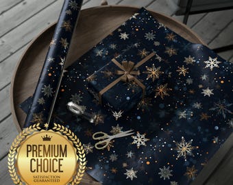May include: Dark blue wrapping paper with gold and silver snowflakes, a wrapped gift with a brown ribbon, and a roll of matching paper. A pair of scissors and a silver tape dispenser are also on the table. The words "Premium Choice" are in a gold emblem.