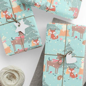 Christmas Woodland Wrapping Paper with Reindeer Fox Bunny Hedgehog and Snowy Trees Holiday Giftwrap for Kids and Winter Presents