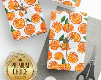 Papel de regalo con estampado de cítricos naranjas, acabado brillante o mate.
