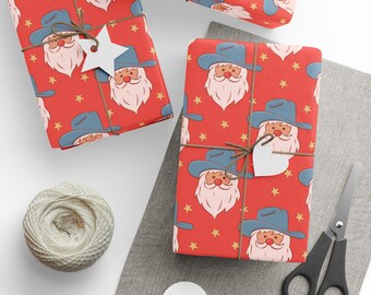 Rolki papieru do pakowania prezentów świątecznych z motywem kowbojskiego Mikołaja, papier do pakowania prezentów świątecznych w stylu western, czerwony papier do pakowania prezentów świątecznych z motywem Mikołaja i gwiazd