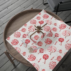Peppermint Candy Wrapping Paper Red and White Holiday Christmas Gift Wrap for Winter Presents with Candy Cane Swirl Pattern Rolls
