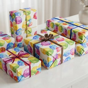 Rainbow Balloon Watercolor Birthday Wrapping Paper, Boys/Girls Birthday Gift Wrap, Balloon Rainbow and White Scrapbooking Paper shown in an AI-generated listing photo