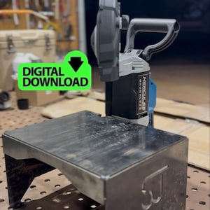 May include: A black metal step stool with a power tool attached. The power tool is gray and black with blue accents. The stool has a rectangular top and is on a metal surface. The image includes a green "DIGITAL DOWNLOAD" graphic.