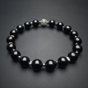 Black Tourmaline,
Tourmaline Bracelet,
armband schorl,
edelsteinarmband,
armband aus turmalin,
schwarzer turmalin,
Protection bracelet,
Chakra Bracelet,
Anxiety Relief,
Capricorn bracelet,
turmalin armband,
natur turmalin,
bracelet tourmaline,