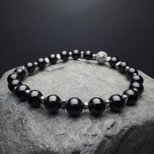 Black Tourmaline,
Tourmaline Bracelet,
armband schorl,
edelsteinarmband,
Protection bracelet,
Chakra Bracelet,
Anxiety Relief,
Capricorn bracelet,
turmalin armband,
bracelet tourmaline,
EM-Shielding stone,
natural tourmaline,
6mm black tourmaline,