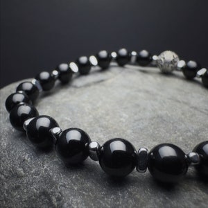 Black Tourmaline,
Tourmaline Bracelet,
armband schorl,
edelsteinarmband,
Protection bracelet,
Chakra Bracelet,
Anxiety Relief,
Capricorn bracelet,
turmalin armband,
bracelet tourmaline,
EM-Shielding stone,
natural tourmaline,
6mm black tourmaline,