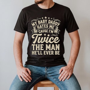 Savage Quote Shirt My Baby Daddy Hates Me Cause Im Twice The Man Hell Ever T-Shirt Graphic Tee