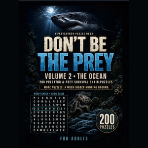 May include: A puzzle book titled Don't Be The Prey Volume 2 The Ocean featuring a shark at the top, an octopus and fish below, and a word search grid. The cover text includes 200 Predator & Prey Survival Chain Puzzles and For Adults.
