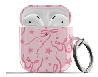 May include: Pink Airpods case with a pink ribbon and star pattern. The case has a silver ring attached to it.