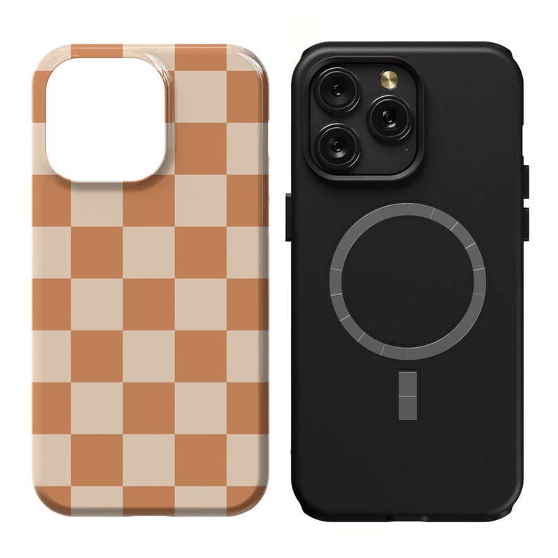 May include: Two phone cases, one with a black and white chequered pattern and the other with a black case and a silver ring on the back.