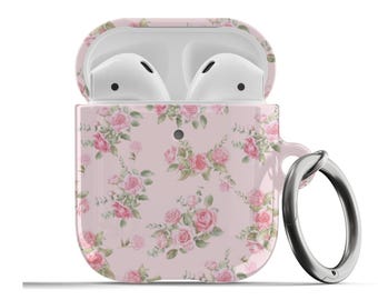 May include: A pink floral patterned case for Apple AirPods with a silver metal carabiner.