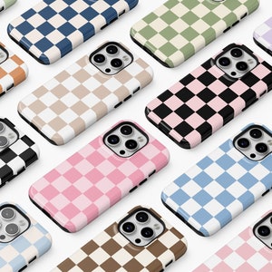 May include: A collection of phone cases featuring a checkered pattern in a variety of colours, including black, white, pink, blue, green and orange.