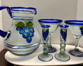 vintage hand blown Mexican pitcher, candle sticks and margarita glasses