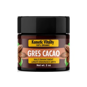 May include: A small brown jar with a black lid and a label that reads "Kemetic Vitality 100% ORGANIC GRES CACAO MALE ENHANCEMENT LENGTH ENDURANCE GIRTH Net wt. 2 oz".
