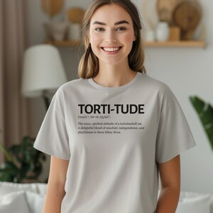 torti-tude definition t-shirt, tortoiseshell cat lover shirt,
cat lover gift, funny cat shirt, tortoiseshell cat apparel, pet owner t-shirt, cat lover definition shirt, tortoiseshell cat pride, torti-tude apparel