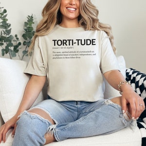 torti-tude definition t-shirt, tortoiseshell cat lover shirt,
cat lover gift, funny cat shirt, tortoiseshell cat apparel, pet owner t-shirt, cat lover definition shirt, tortoiseshell cat pride, torti-tude apparel