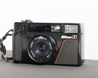 Nikon L35 AF 35mm Film Camera with ISO 1000
