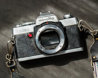 Minolta XG 1 (Original) 35mm Camera Body and Neckstrap
