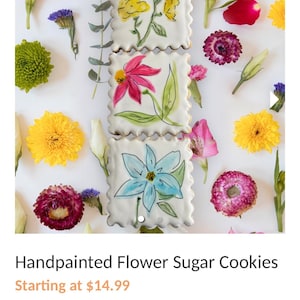 May include: Three hand-painted sugar cookies decorated with different flower designs. The cookies are square-shaped and have a white background. The flowers are painted in shades of yellow, pink, and blue.