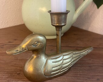 Brass duck candle holder