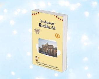May include: A textbook titled "Tedesco livello A1" in Italian, with a light yellow cover. The cover features German flag decorations, a heart, a pretzel, and an image of a building. The text on the cover says "More than 100 pages to learn German without too many words."