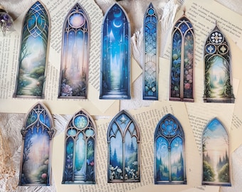 Bookmarks in the shape of a gothic window overlooking fantastic and magical landscapes