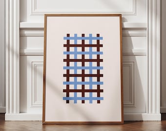 Könnte beinhalten: Gerahmter Kunstdruck mit geometrischem Design. Das Kunstwerk zeigt ein Rastermuster aus abwechselnd braunen und blauen horizontalen und vertikalen Linien auf cremefarbenem Hintergrund. Der Rahmen hat eine warme braune Farbe.