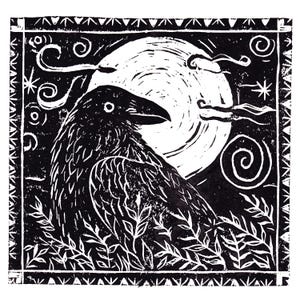 May include: Black and white linocut print depicting a raven with a full moon. The raven is positioned above leafy foliage, with swirling clouds and stars. The print is framed by a decorative border.
