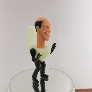 Walking skibidi toilet with legs (glows in the dark) 8cm