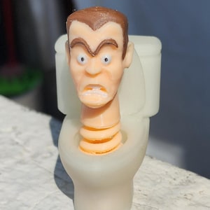 Skibidi Toilet Glow in the Dark G-Man Spring Head 8cm
