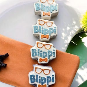 BLIP-badbom | stripfiguur | cadeaus voor kinderen | badschuim | badbommen | cranberry-crush-geur