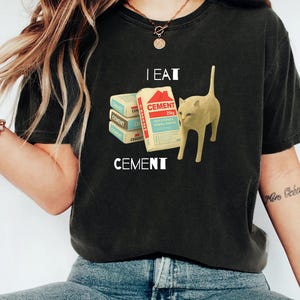 Camiseta &quot;Me como cemento&quot;, &quot;Gato maldito&quot;, &quot;Meme irónico y divertido&quot;, &quot;Amante de los gatos desquiciado&quot;, &quot;Humor de internet vergonzoso&quot;, &quot;Gato con una peculiaridad peculiar&quot;