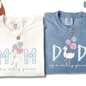 Personalized Comfort Colors mom and dad shirts with goose and balloons, funny mom of a silly goose and dad of a silly goose design, cute pastel graphic tees, gift for parents, ivory and blue jean color options