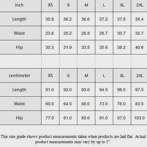 May include: Size guide showing product measurements in inches and centimeters for XS to 2XL. Measurements include length, waist, and hip. The length ranges from 35.8 to 38.4 inches, and 91.0 to 97.5 centimeters.