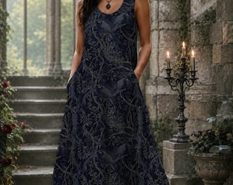 May include: A sleeveless floor-length maxi dress in a dark navy blue hue, featuring a repeating pattern of perched birds amidst intricate tree branches and foliage. The garment includes a scoop neckline and side pockets, crafted in a flowing silhouette.