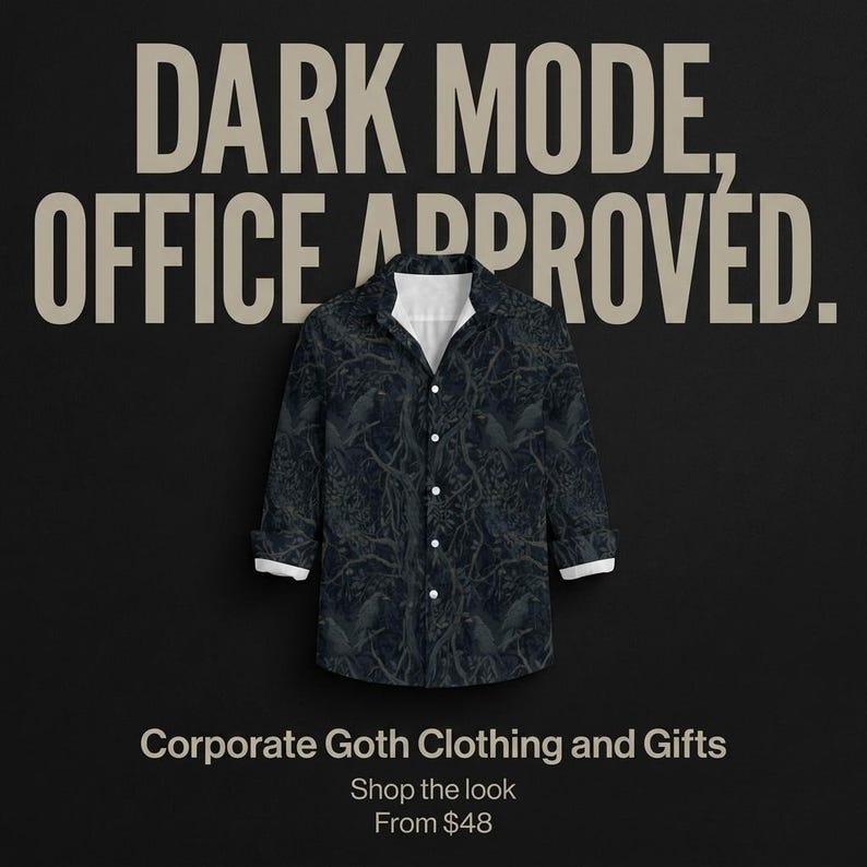 May include: A long-sleeved button-down shirt featuring a dark, intricate forest and bird pattern, white inner collar, and white sleeve cuffs. The text "DARK MODE, OFFICE APPROVED." is displayed above, with "Corporate Goth Clothing and Gifts" below.