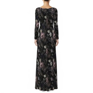 May include: A floor-length long-sleeve dress featuring a dark black base color with an all-over floral print. The pattern consists of muted grey, white, and soft purple rose-like flowers distributed across the entire garment from the neckline to the hem.