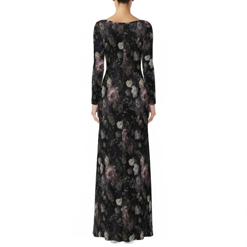 May include: A floor-length long-sleeve dress featuring a dark black base color with an all-over floral print. The pattern consists of muted grey, white, and soft purple rose-like flowers distributed across the entire garment from the neckline to the hem.
