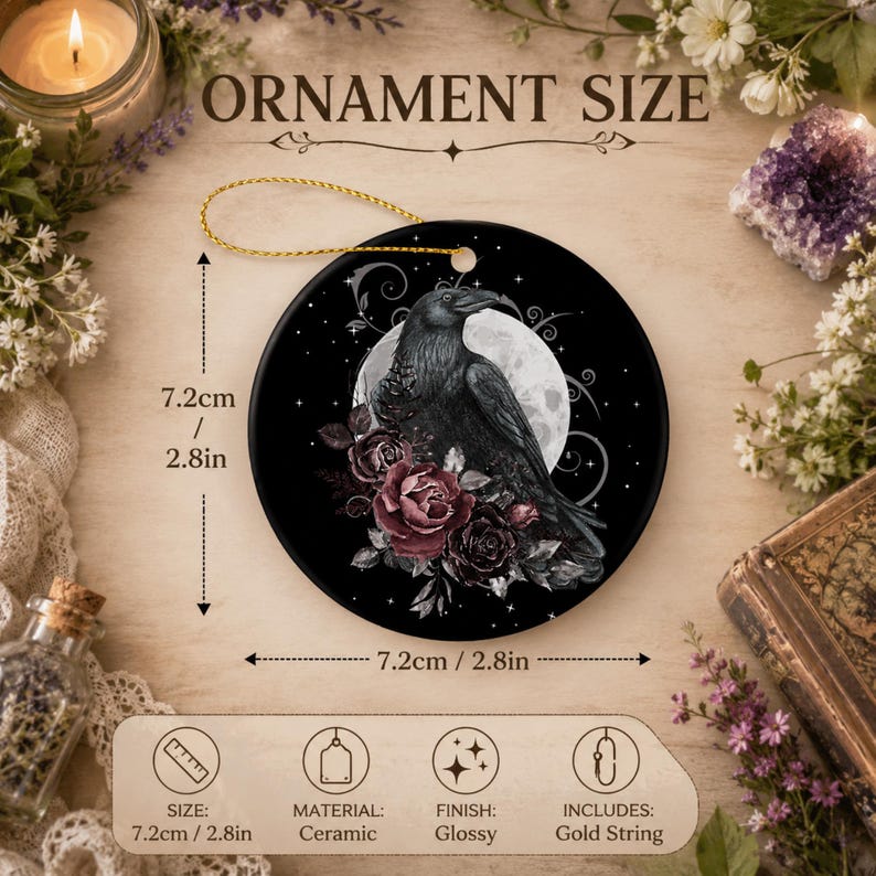 May include: A round ceramic ornament featuring a black raven perched before a full moon, surrounded by dark red roses and stars. The ornament measures 2.8 inches in diameter and includes a gold string. Text on the image reads ORNAMENT SIZE.