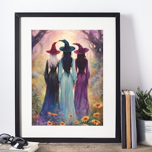 May include: A framed wall art print depicting three figures from behind, wearing long dresses and pointed hats in red, teal, and purple. They stand in a vibrant, colorful forest clearing filled with wildflowers under a soft, glowing light.
