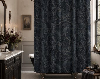 May include: A dark navy blue shower curtain featuring a repeating pattern of black birds perched on intricate, winding tree branches with leaves. The fabric hangs from a curved metal rod with circular rings, displaying a detailed botanical design.