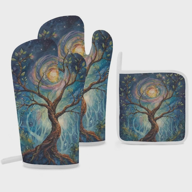May include: A kitchen set consisting of an oven mitt and a square pot holder, both featuring a printed design of a gnarled tree with green leaves set against a swirling blue and purple night sky with a glowing celestial orb and stars.