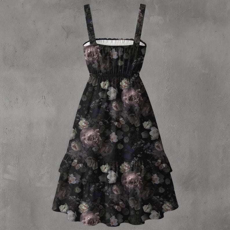 May include: A black midi dress featuring a dark floral print with shades of purple, grey, and white roses. The dress has a square neckline, thick shoulder straps, a gathered elastic bodice, and a tiered skirt with a ruffled hemline finish.
