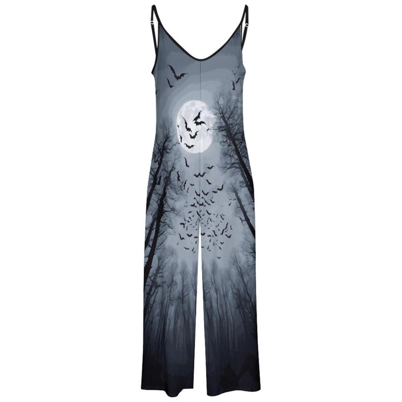 May include: A sleeveless jumpsuit featuring a V-neckline and thin spaghetti straps. The garment displays a grayscale graphic print of a full moon, a dark forest with bare trees, and a large flock of flying bats against a cloudy night sky.